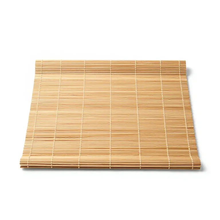 a bamboo cutting mat rolled at one edge, top-down view, single item fully visible and centred...