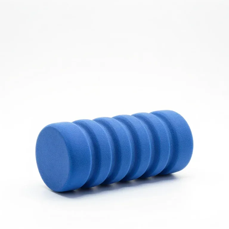 a blue foam massage roller, side view, single item fully visible and centred, isolated on a p...