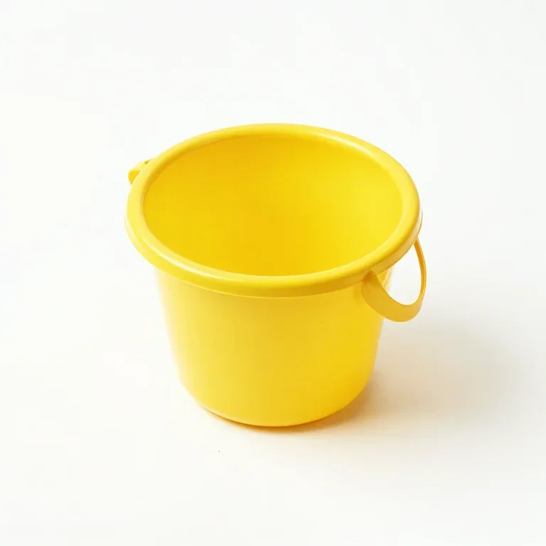 a bright yellow sand mould and bucket set, top-down view, single item fully visible and centr...
