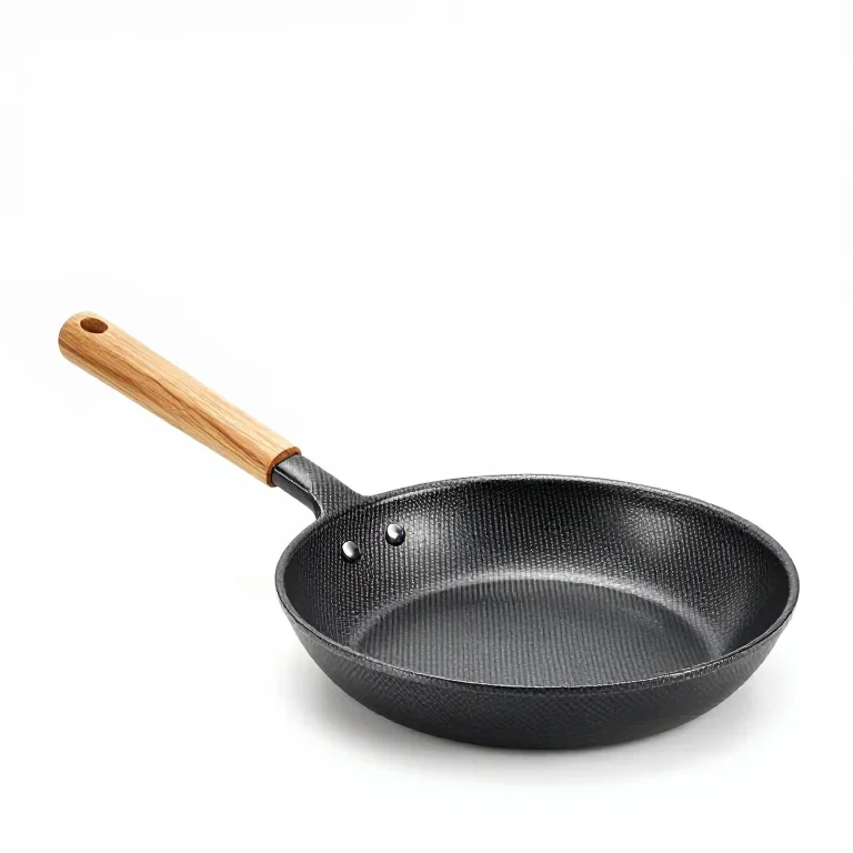 a carbon steel frying pan with a wooden handle, three-quarter view, single item fully visible...