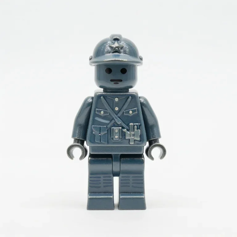 a cast metal toy soldier in a grey-blue uniform, front view, single item fully visible and ce...