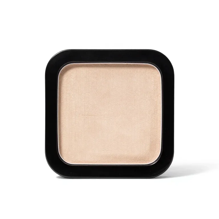 a compact powder case, front view, single item fully visible and centred, isolated on a pure...