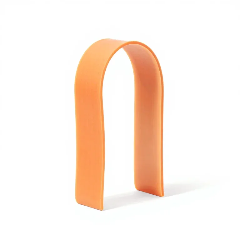 a latex resistance band loop, three-quarter view, single item fully visible and centred, isol...
