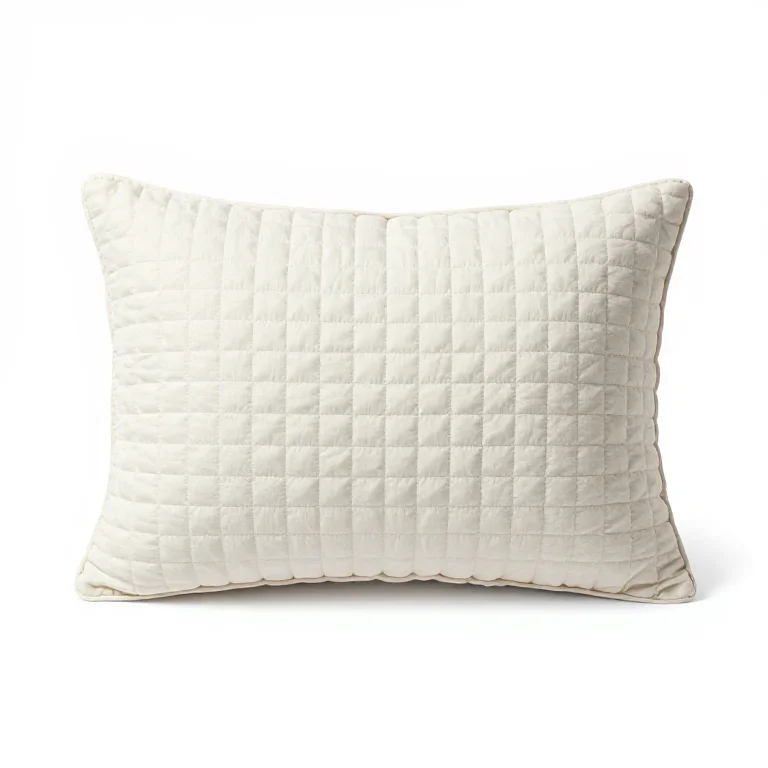 a quilted cotton bath pillow, three-quarter view, single item fully visible and centred, isol...