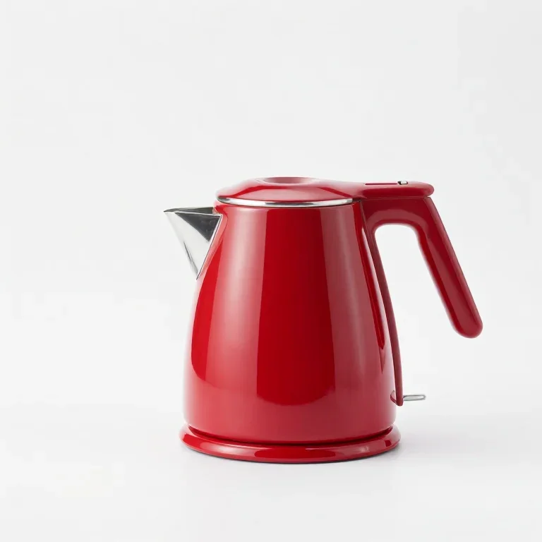 a red retro electric kettle, side view, single item fully visible and centred, isolated on a...