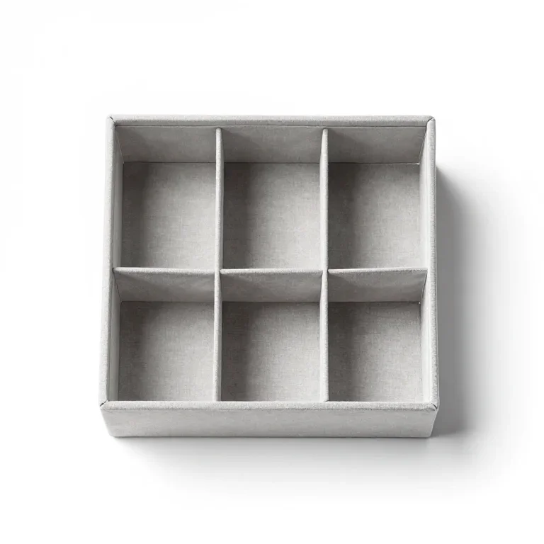 a sewing storage box with divided compartments, top-down view, single item fully visible and...