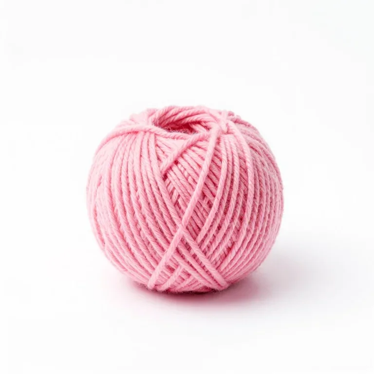 a small ball of pink wool yarn, front view, single item fully visible and centred, isolated o...