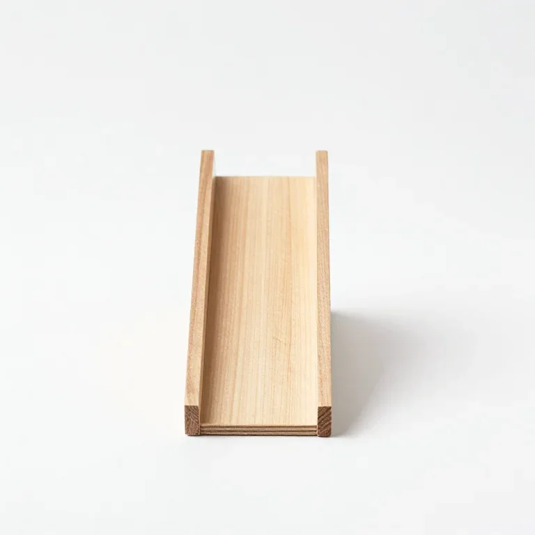 a small wooden marble run ramp, front view, single item fully visible and centred, isolated o...