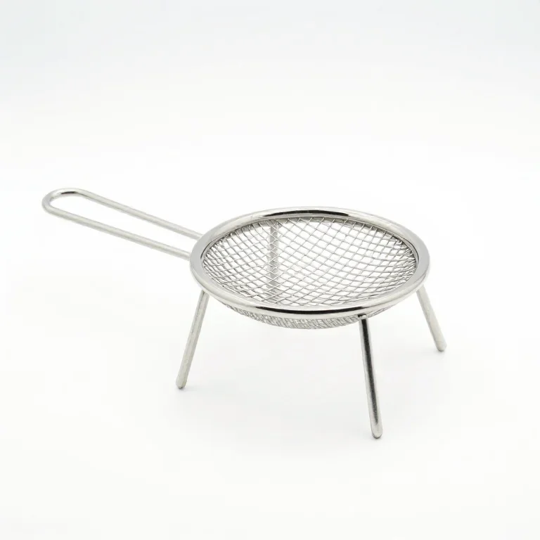 a stainless steel spider skimmer, three-quarter view, single item fully visible and centred,...