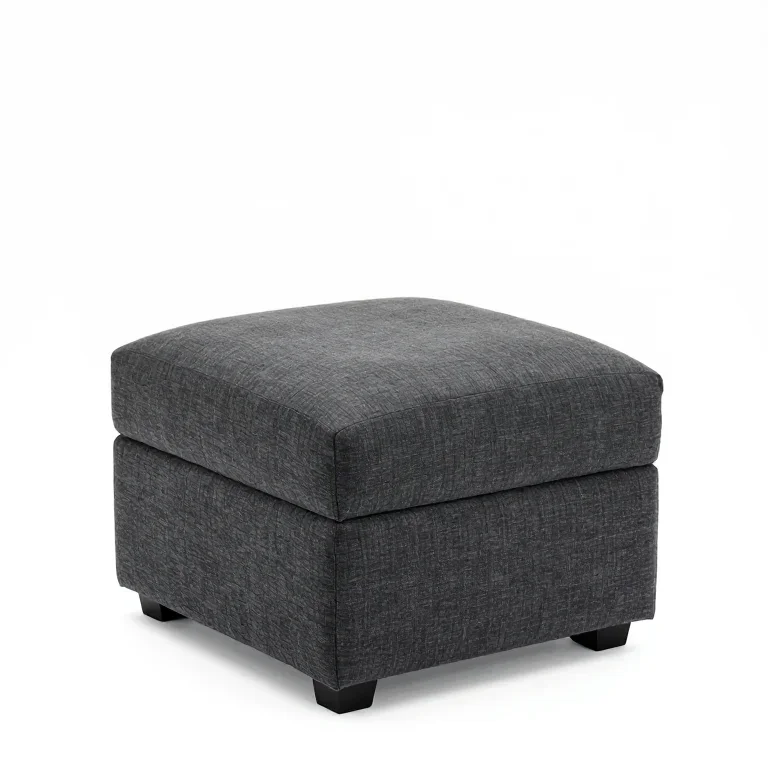 an upholstered storage ottoman in charcoal, three-quarter view, single item fully visible and...