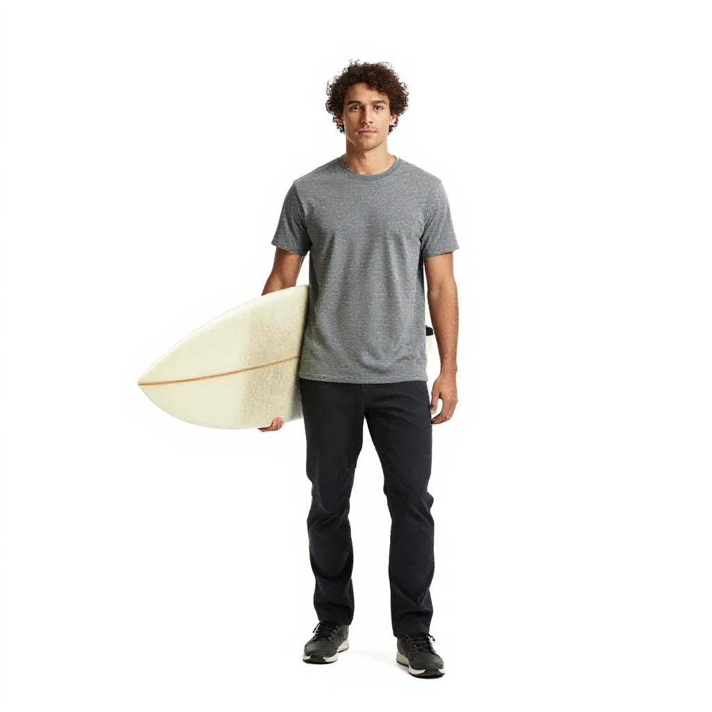 Surfer carrying a board isolated on a white background