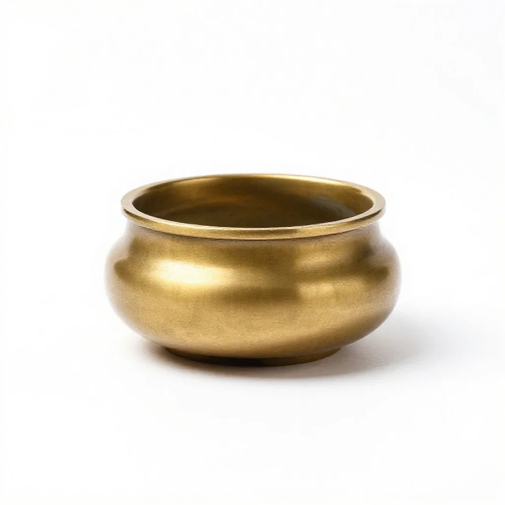 Brass incense burner isolated on a white background