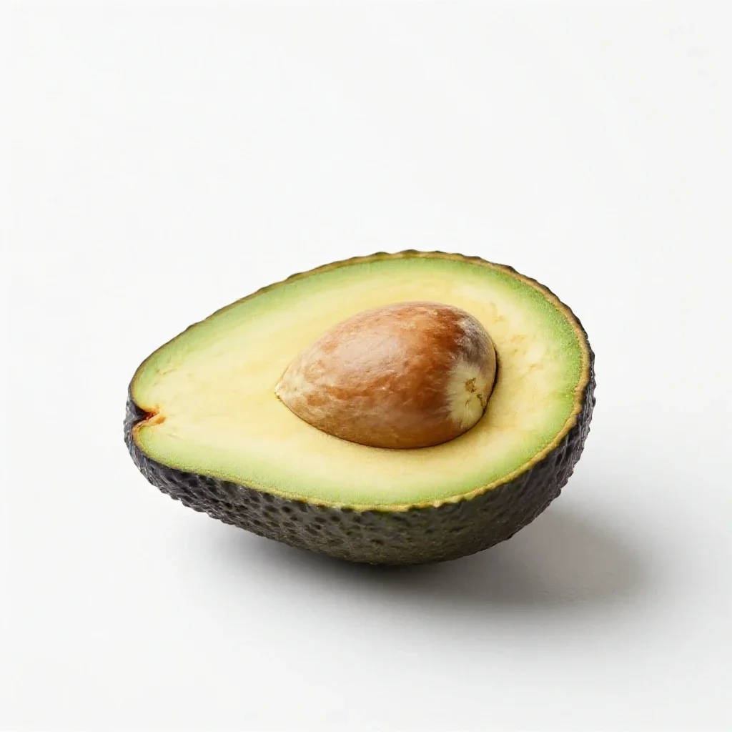 Avocado halved with the stone isolated on a white background