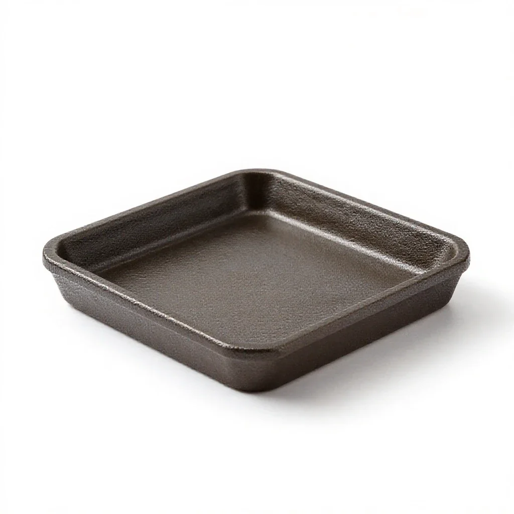 Trivet in cast iron isolated on a white background