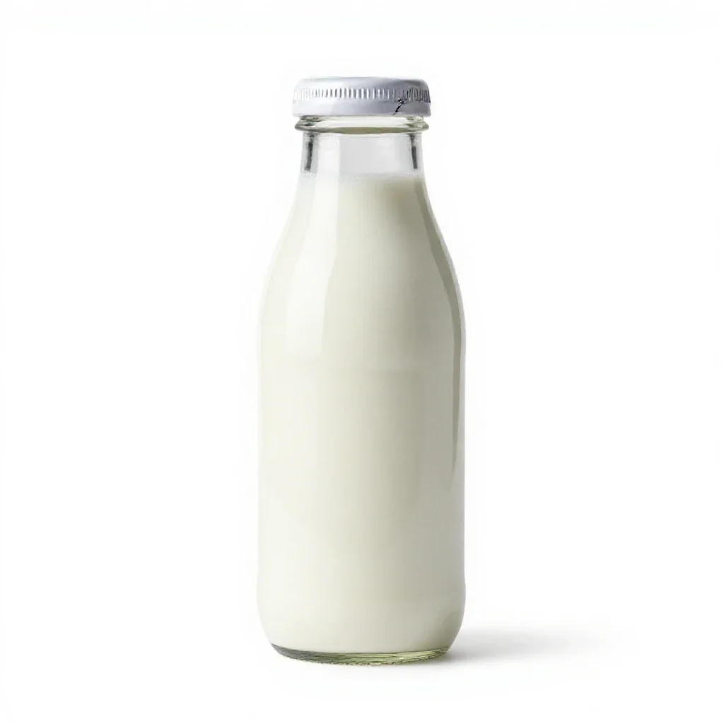 Milk bottle with a foil cap isolated on a white background