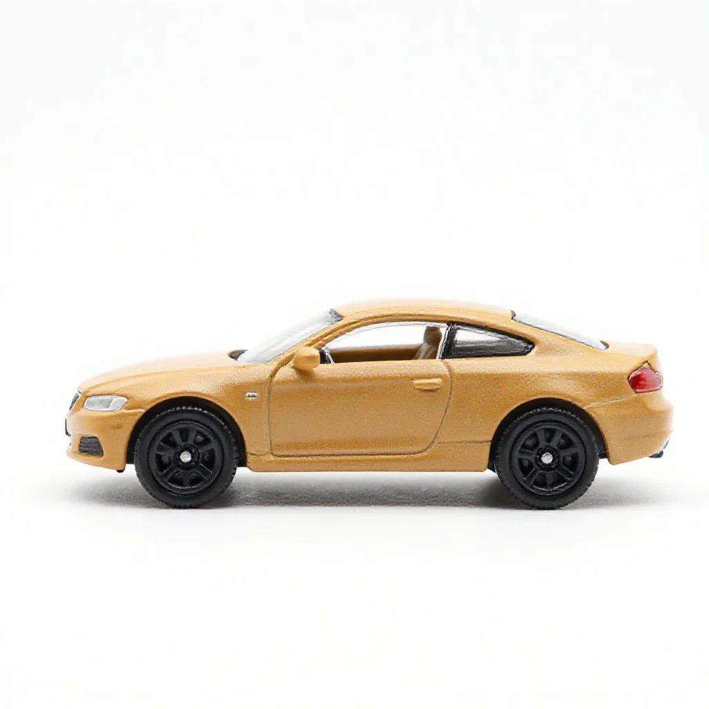 Die-cast toy car isolated on a white background