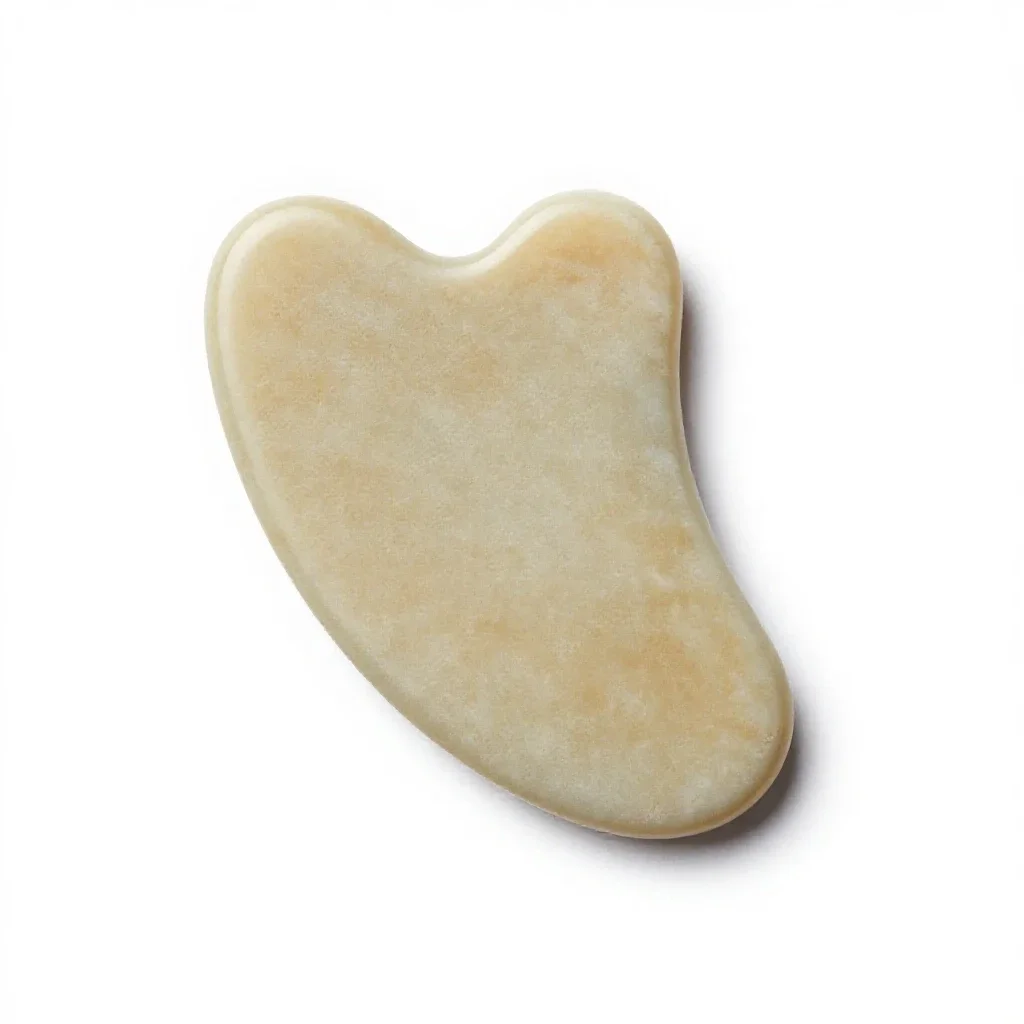 Gua sha stone isolated on a white background