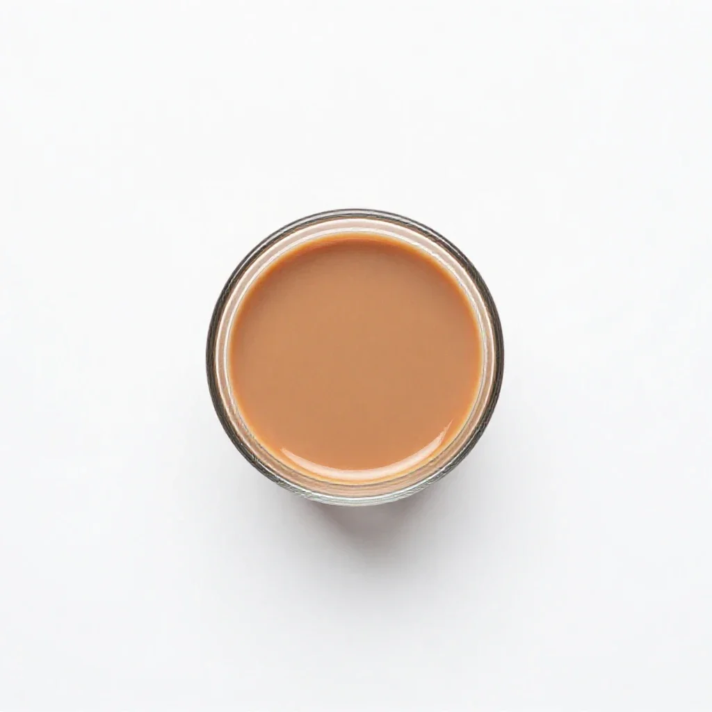Masala chai in a glass isolated on a white background