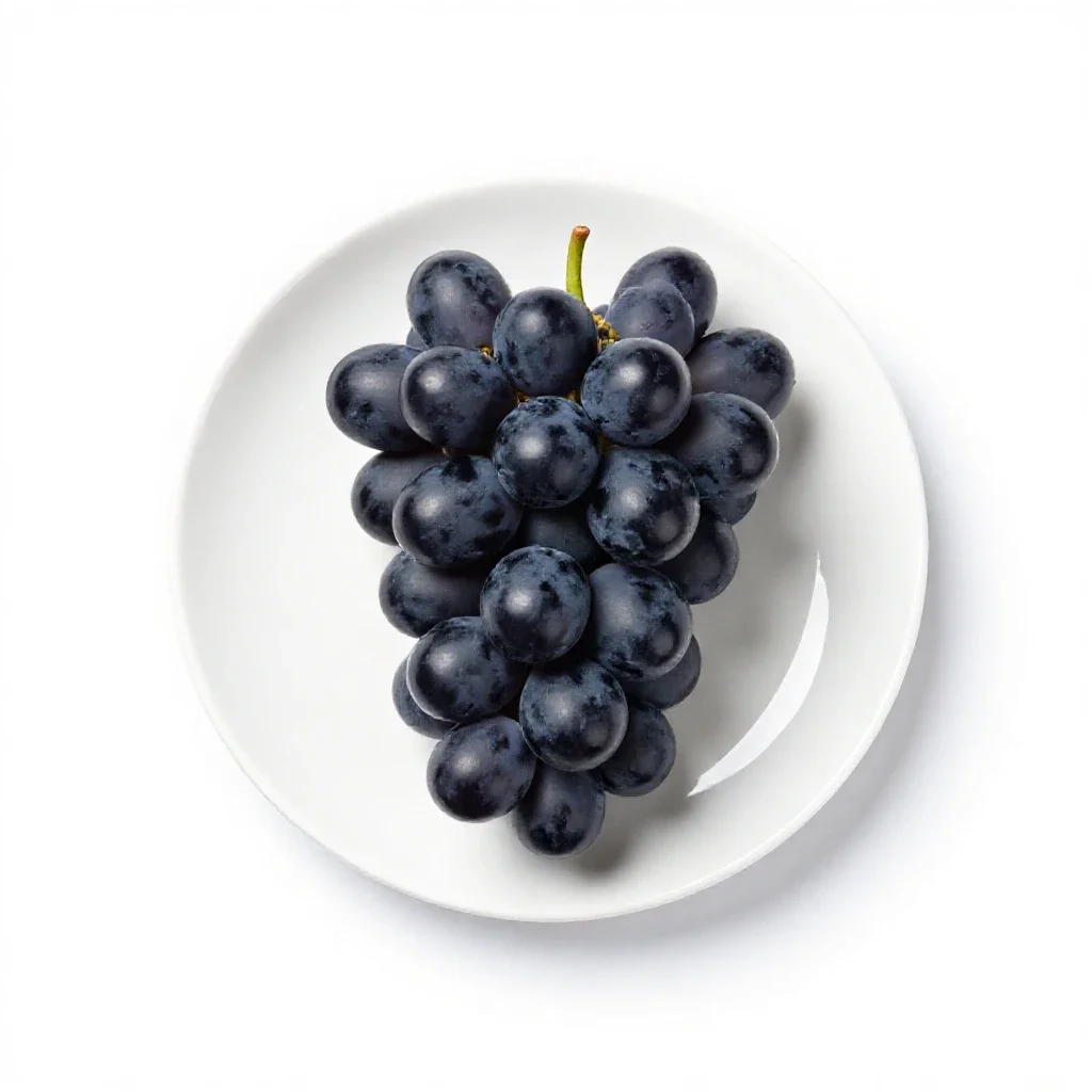 Bunch of black grapes isolated on a white background