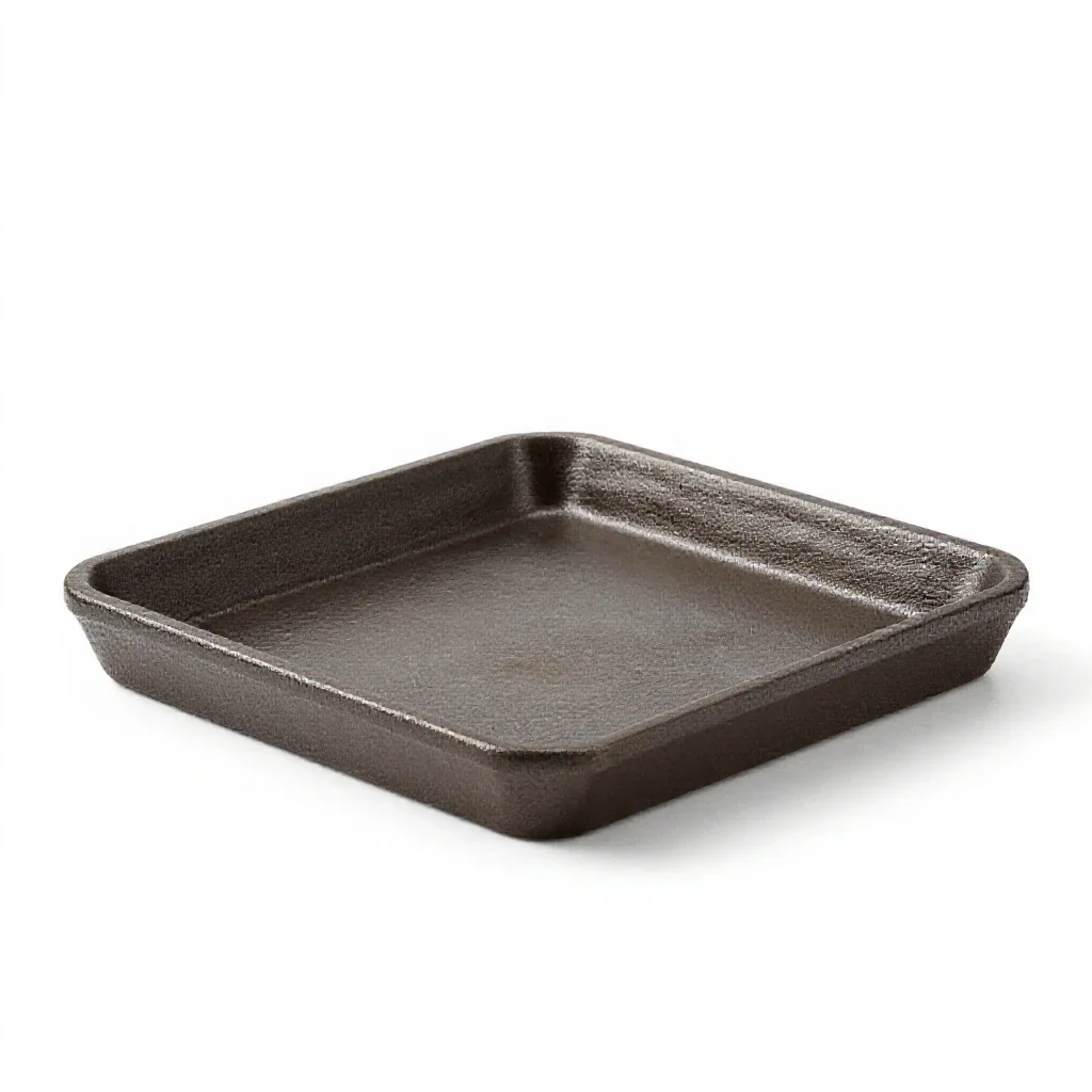 Trivet in cast iron isolated on a white background