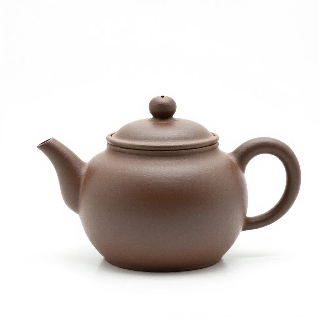 Teapot with an infuser isolated on a white background