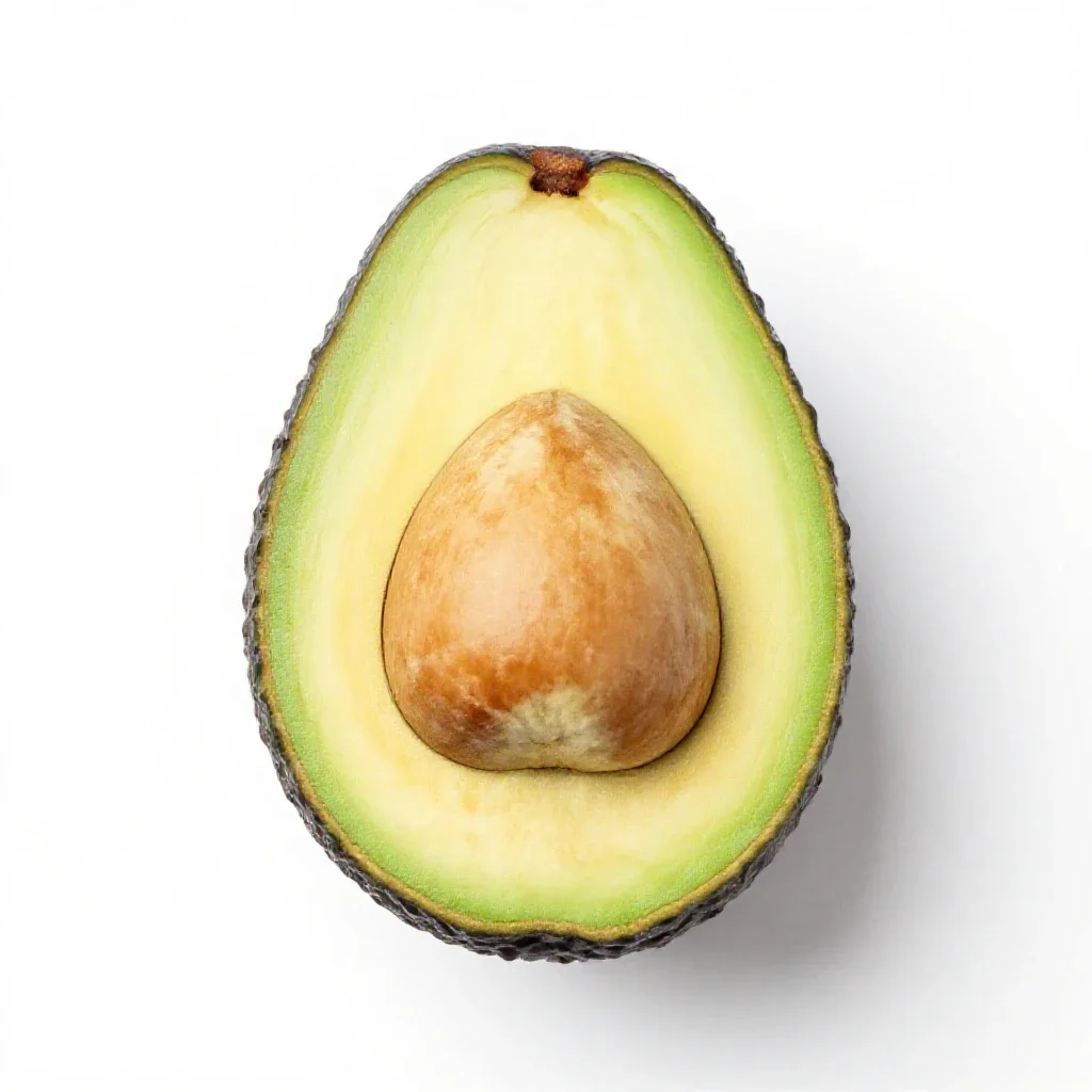 Avocado halved with the stone isolated on a white background