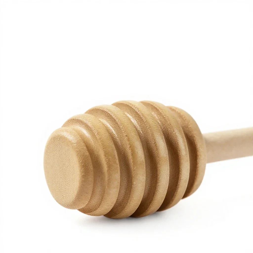 Honey dipper isolated on a white background