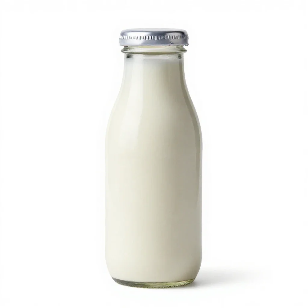 Milk bottle with a foil cap isolated on a white background