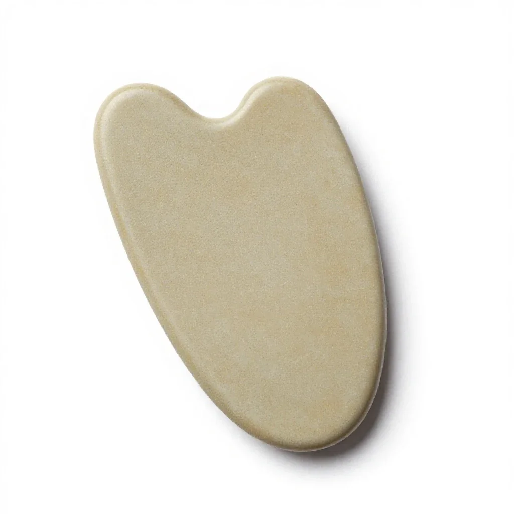 Gua sha stone isolated on a white background