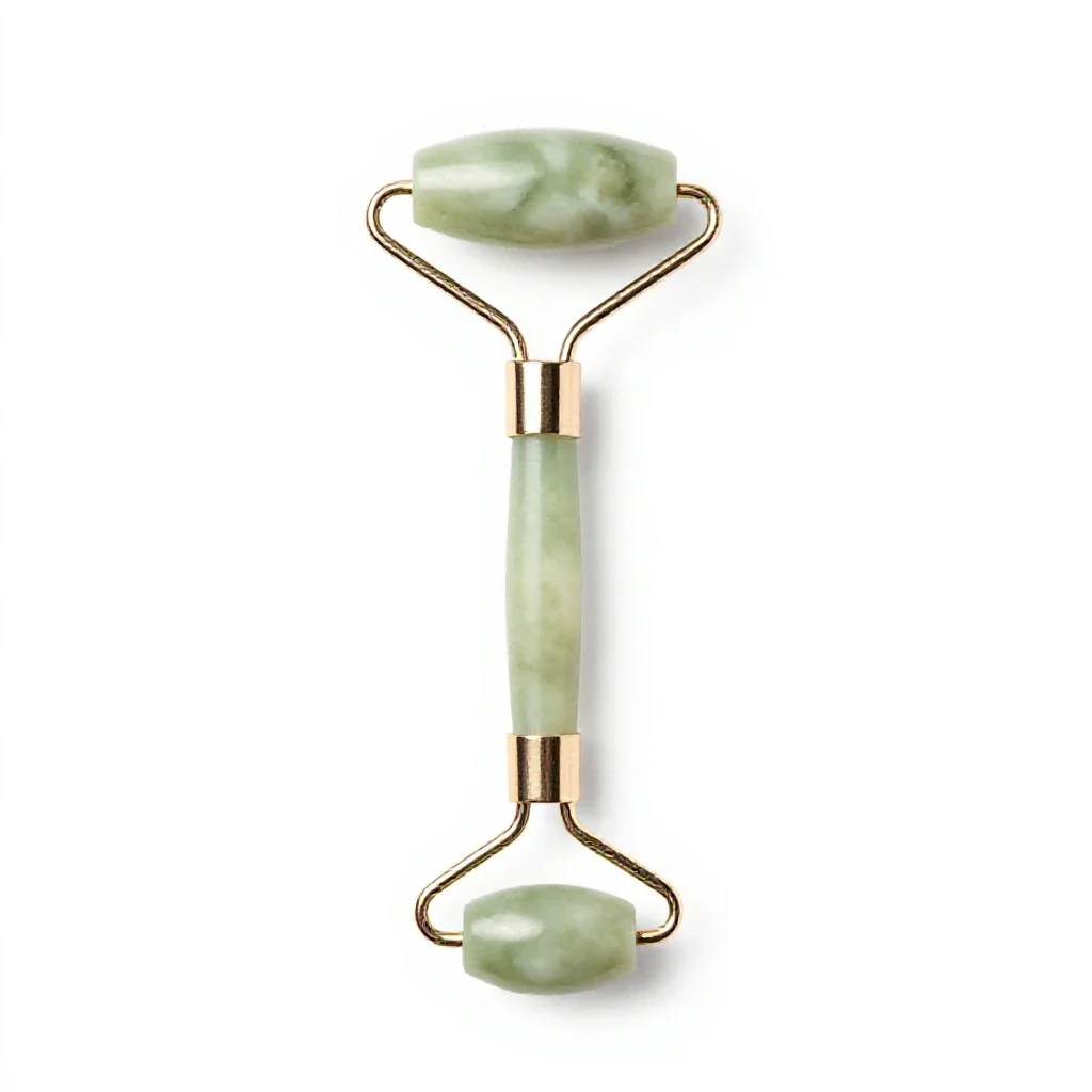 Jade facial roller isolated on a white background