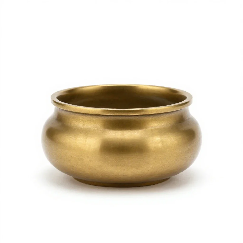 Brass incense burner isolated on a white background