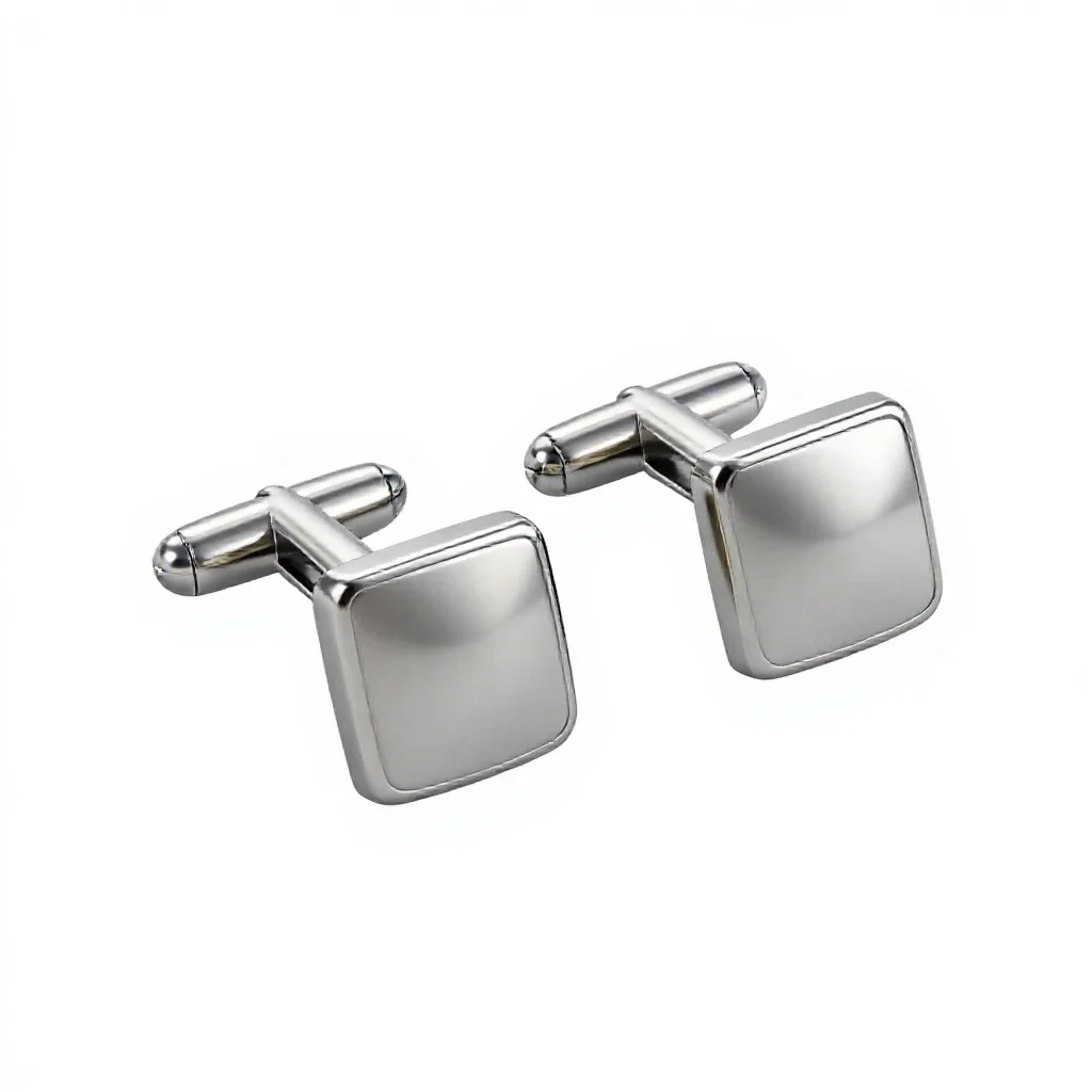 Pair of cufflinks isolated on a white background