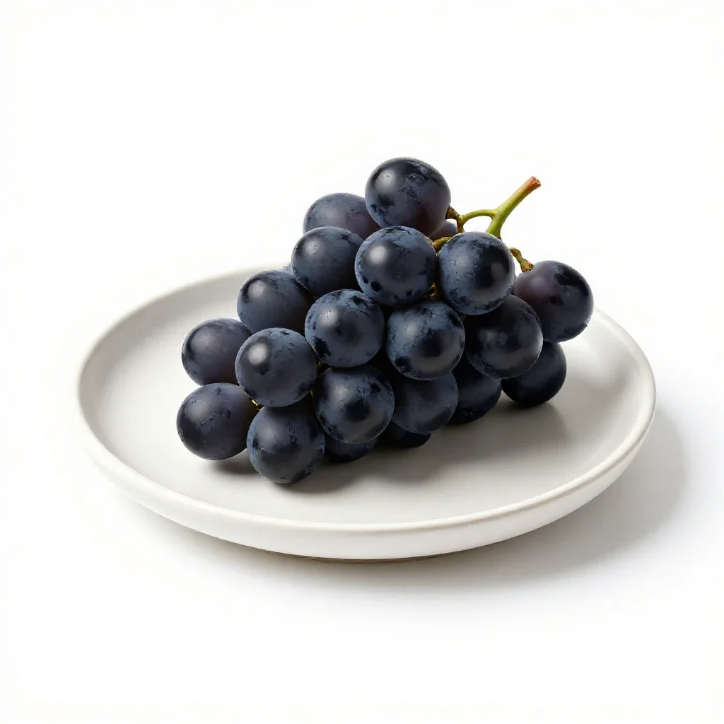 Bunch of black grapes isolated on a white background
