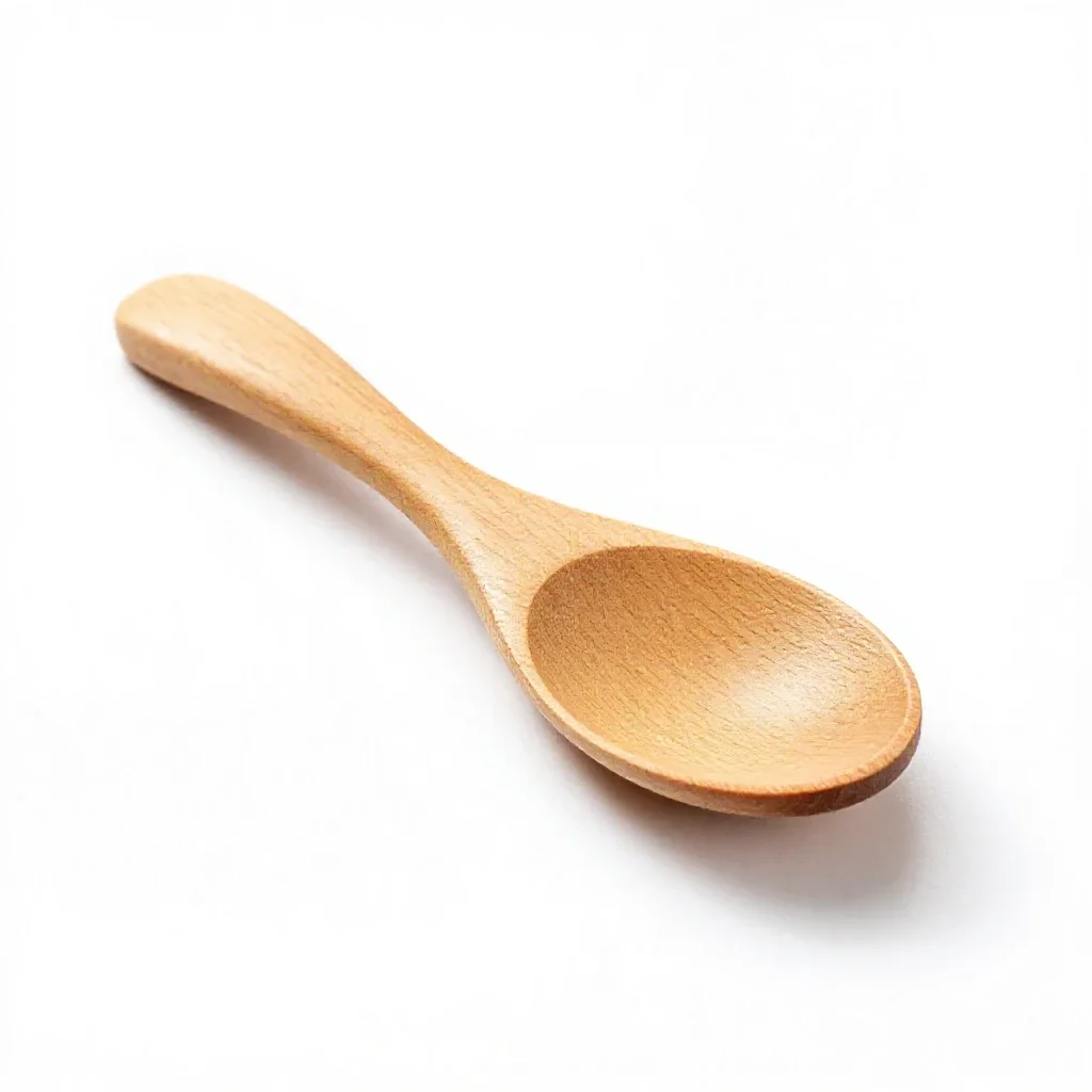 Wooden spoon isolated on a white background