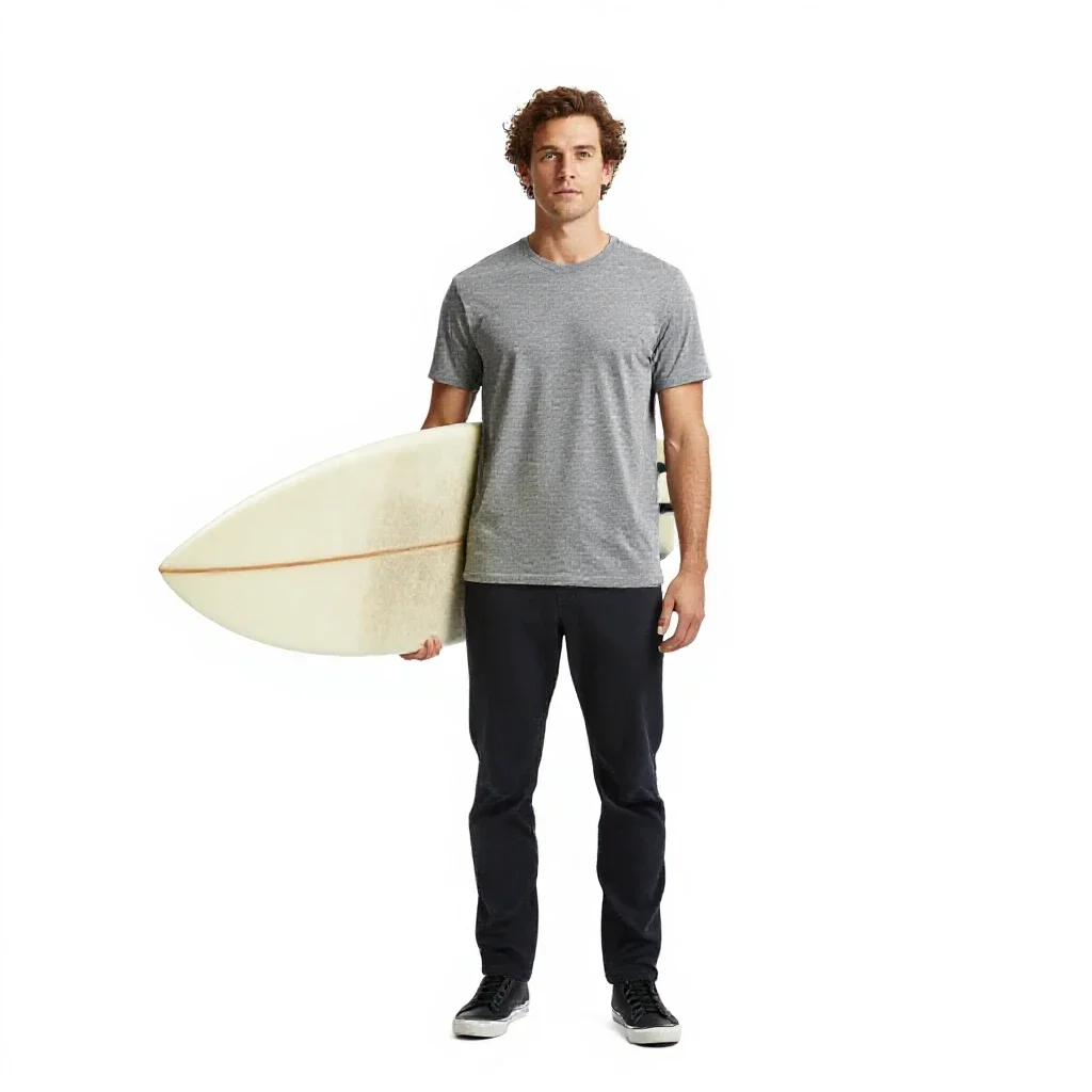 Surfer carrying a board isolated on a white background