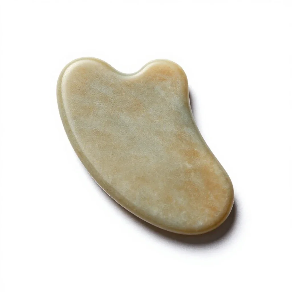 Gua sha stone isolated on a white background