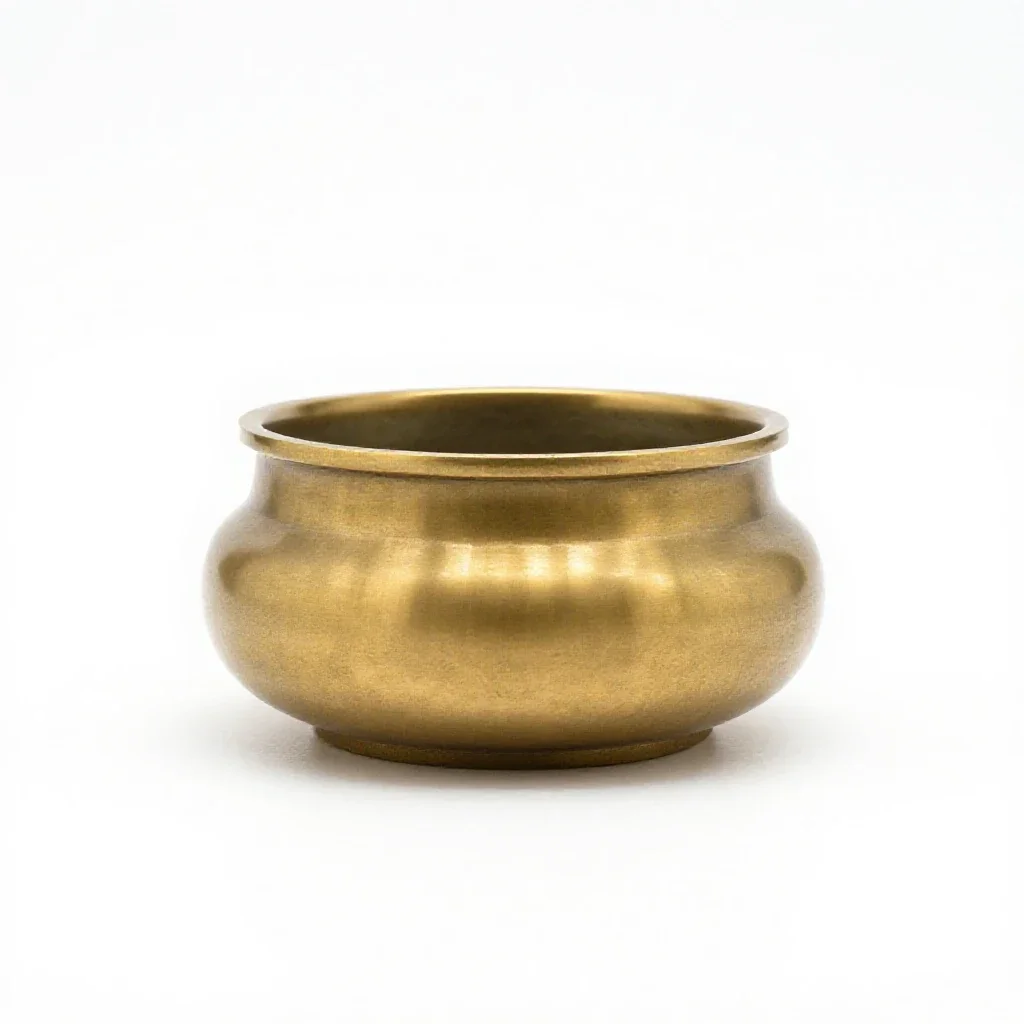 Brass incense burner isolated on a white background