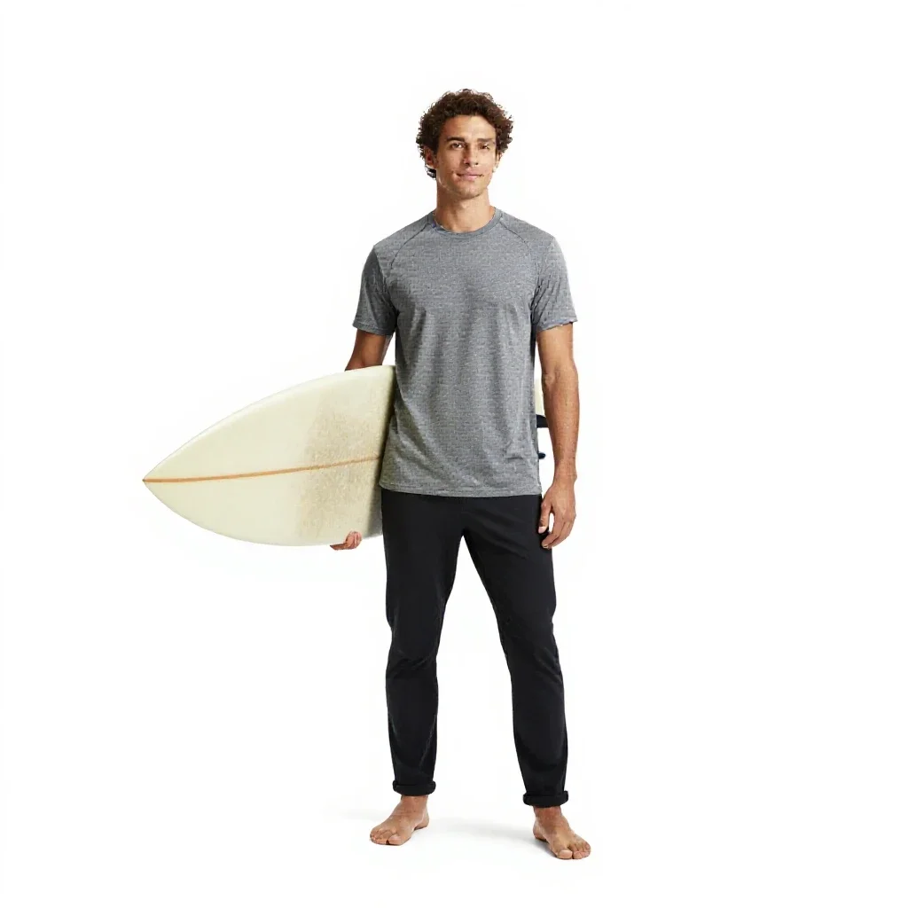 Surfer carrying a board isolated on a white background