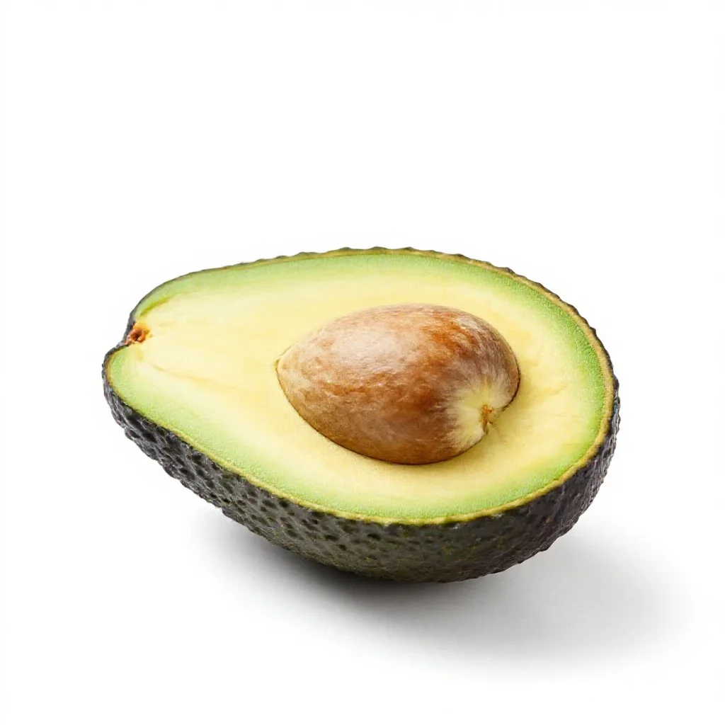 Avocado halved with the stone isolated on a white background
