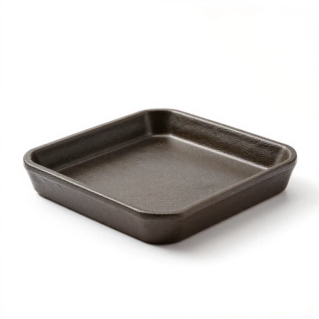 Trivet in cast iron isolated on a white background