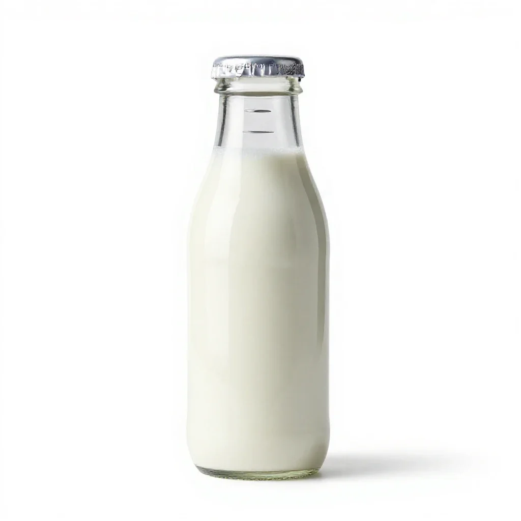 Milk bottle with a foil cap isolated on a white background