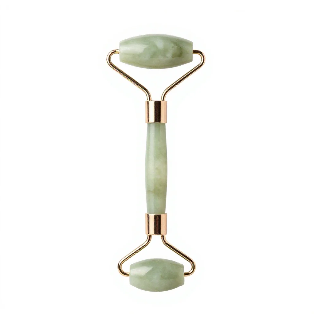 Jade facial roller isolated on a white background