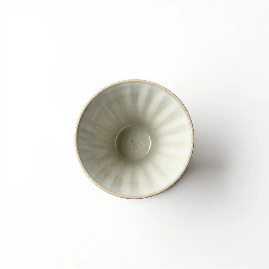 Ceramic pour-over dripper isolated on a white background