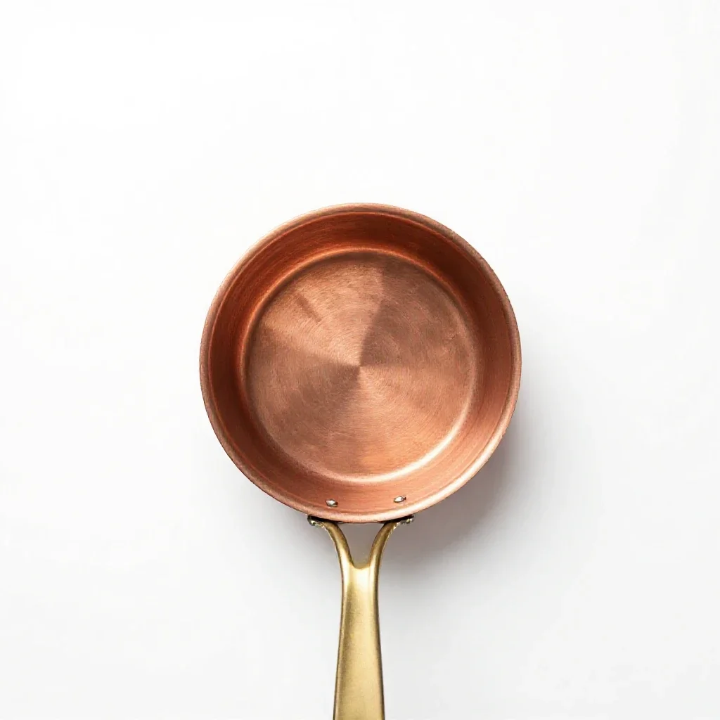 Copper saucepan isolated on a white background