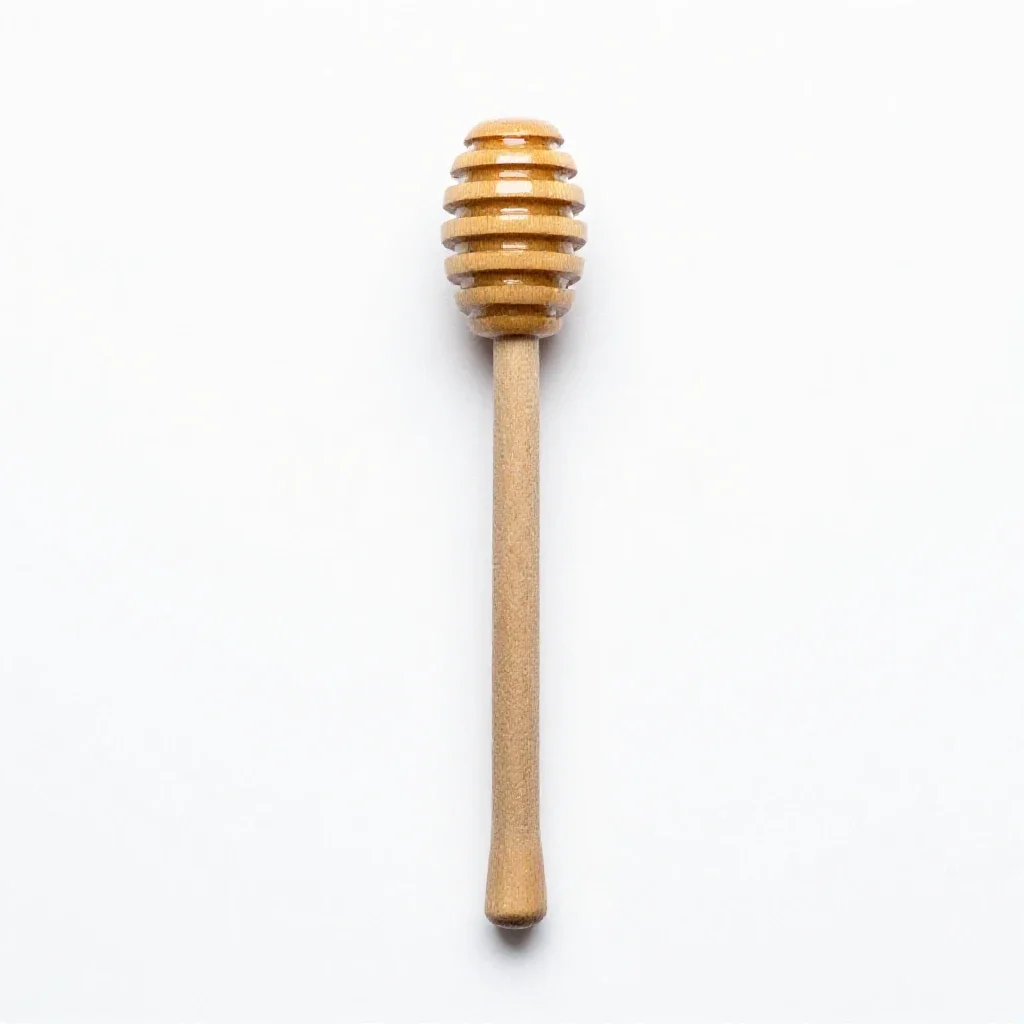 Honey dipper isolated on a white background