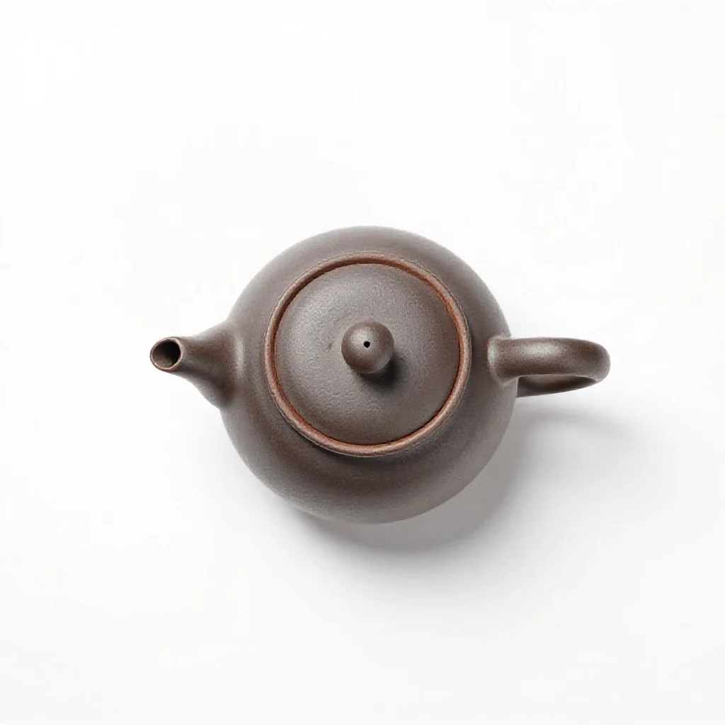 Teapot with an infuser isolated on a white background