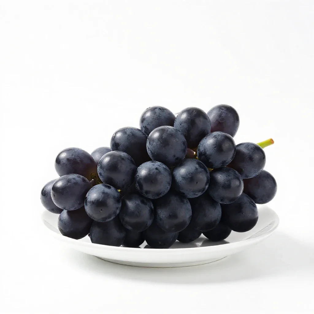 Bunch of black grapes isolated on a white background