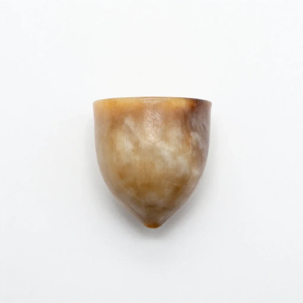 Powder horn isolated on a white background
