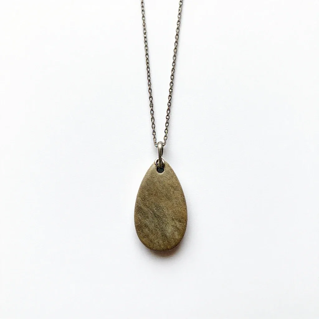 Amulet on a chain isolated on a white background