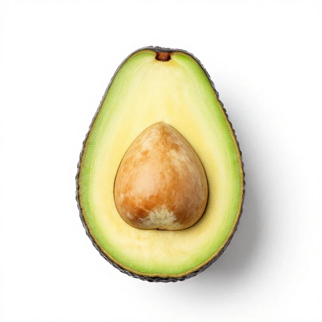 Avocado halved with the stone isolated on a white background